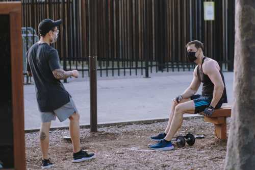 Working out with personal trainer in the park