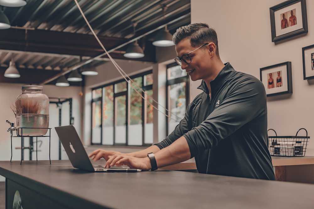 Man sitting with good posture at work place