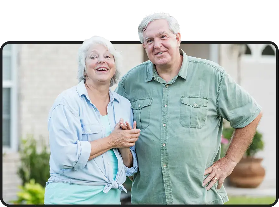 Senior couple smiling together outdoors