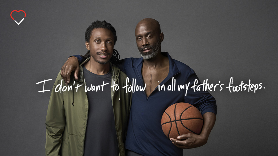 Man and his father holding a basketball, representing a father's hidden genetic cardiovascular risk