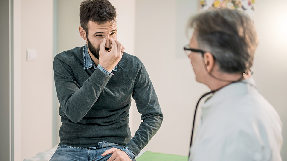 Doctor and patient discussing allergies
