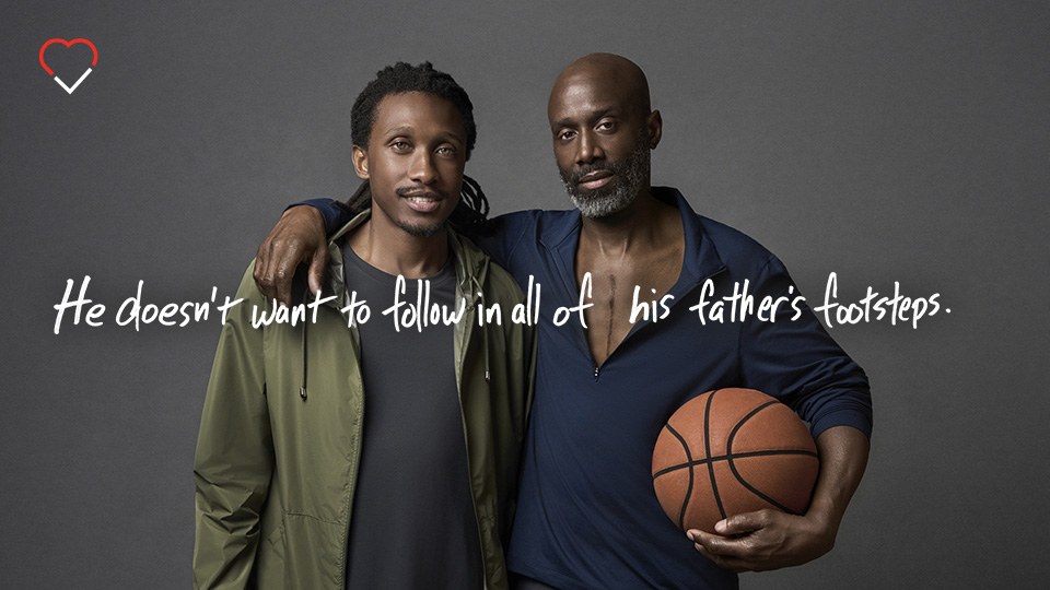 Man and his father holding a basketball, with overlaid text: "He doesn't want to follow in all of his father's footsteps."