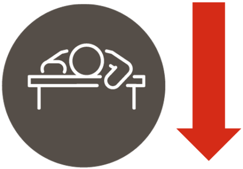 person sleeping on desk beside a down arrow