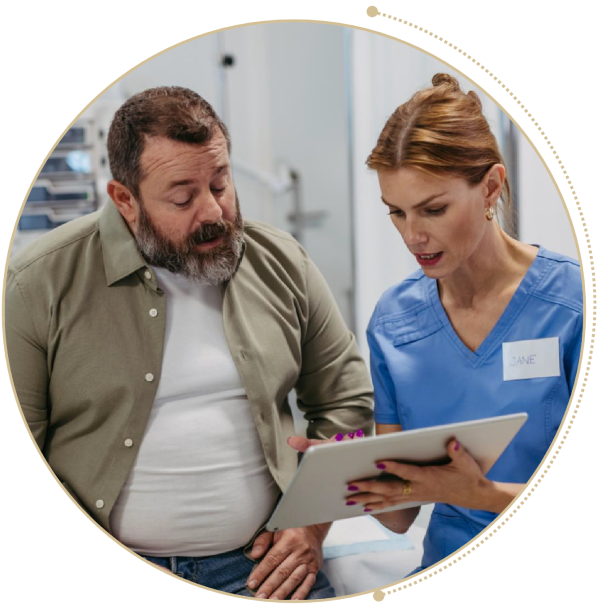 Male patient talking to female clinician