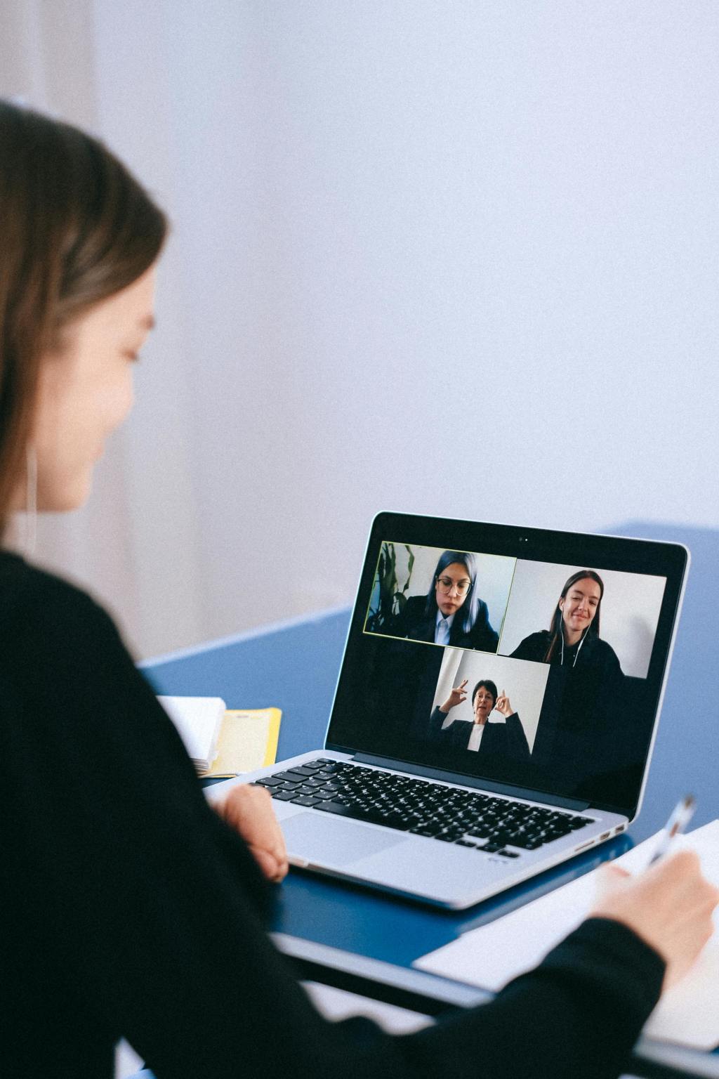 A group of people having an online meeting