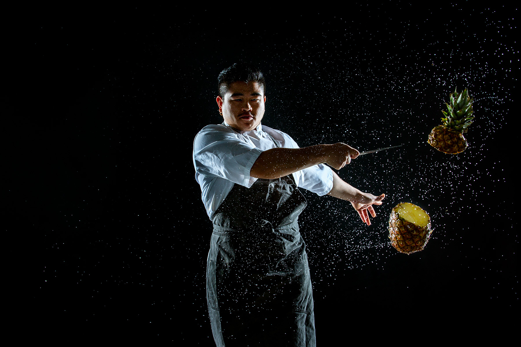 pineapple cutting sharp knife cook chef Las Vegas Herringbone canon profoto stop action freeze motion