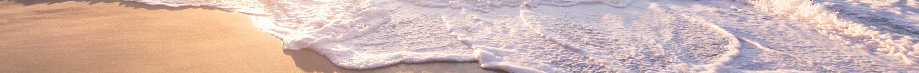 Strandbølger ved kysten