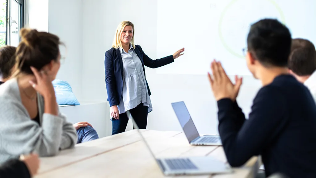 woman presenting in an office