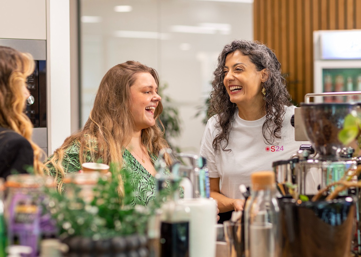 Two women smiling