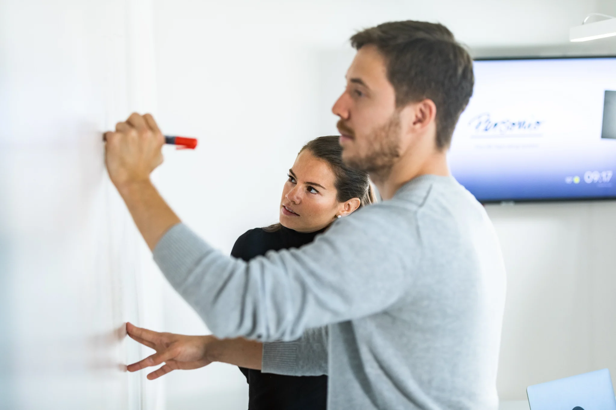 employees discussing a career progression framework