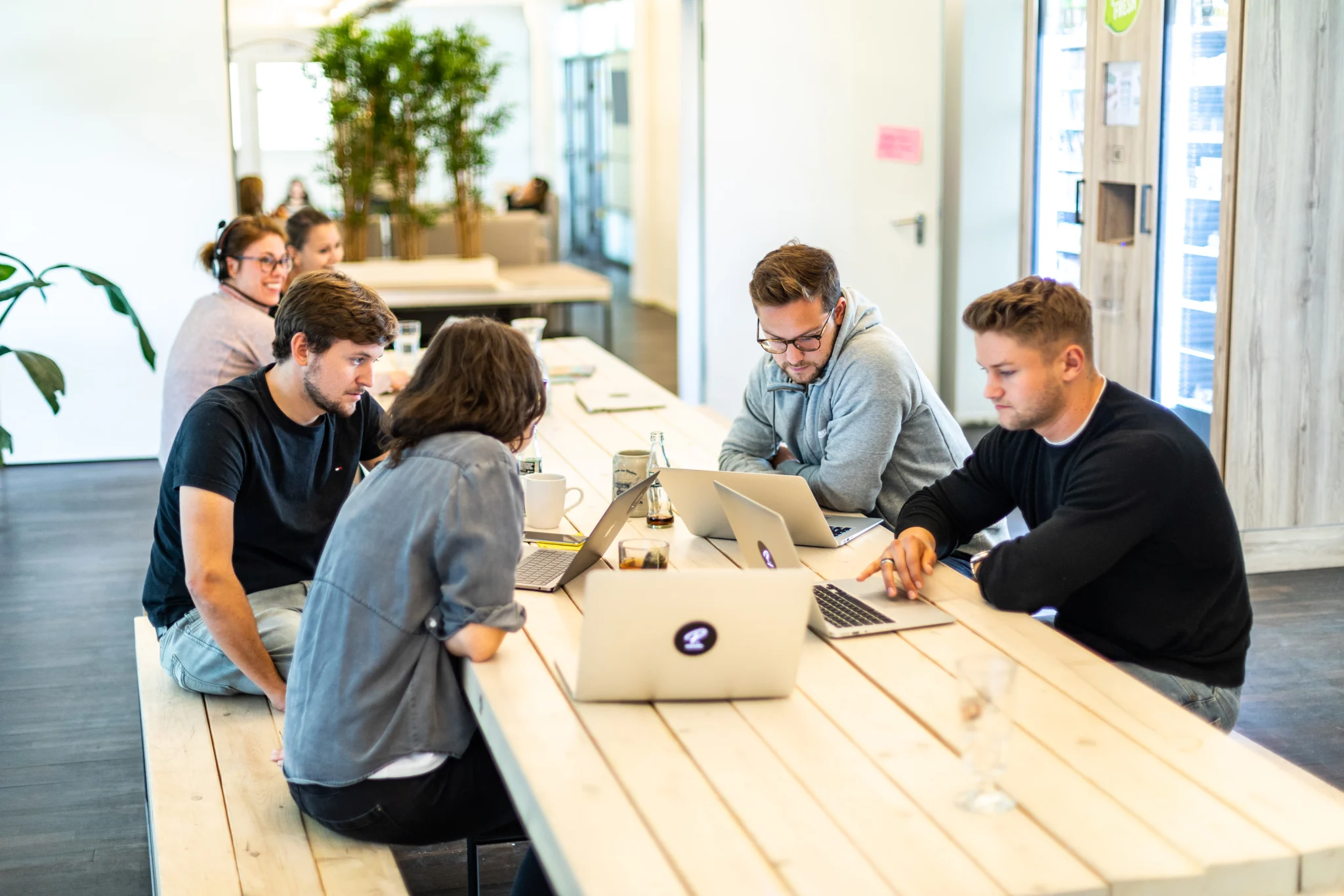 Four people working together