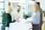 employees collaborating while hybrid working