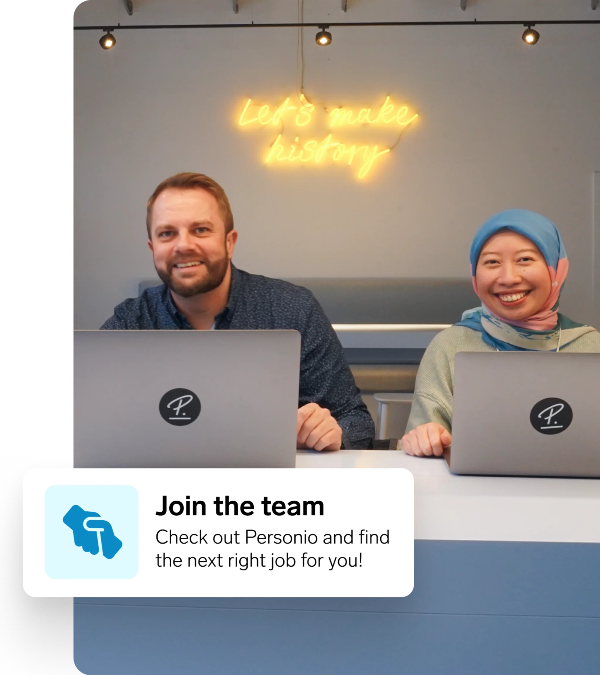 Data teammates at laptop smiling