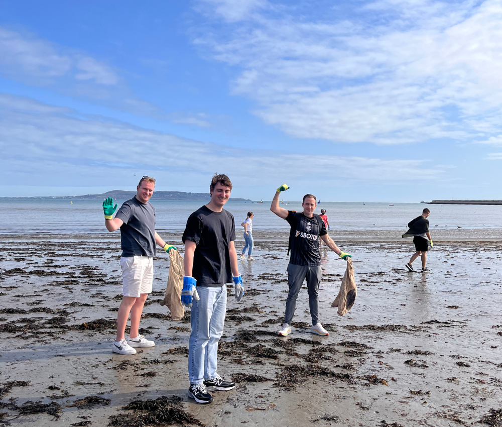 Employees at beach clean up