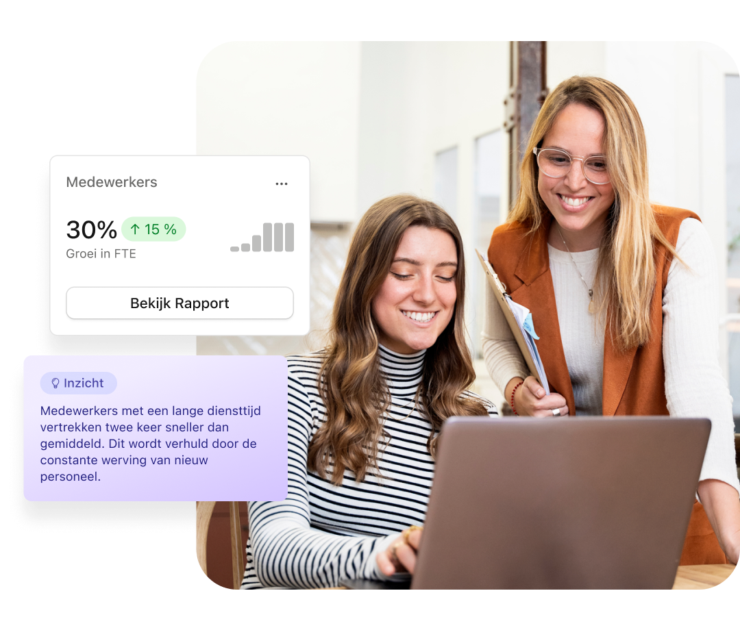 Two employees looking at Personio insights