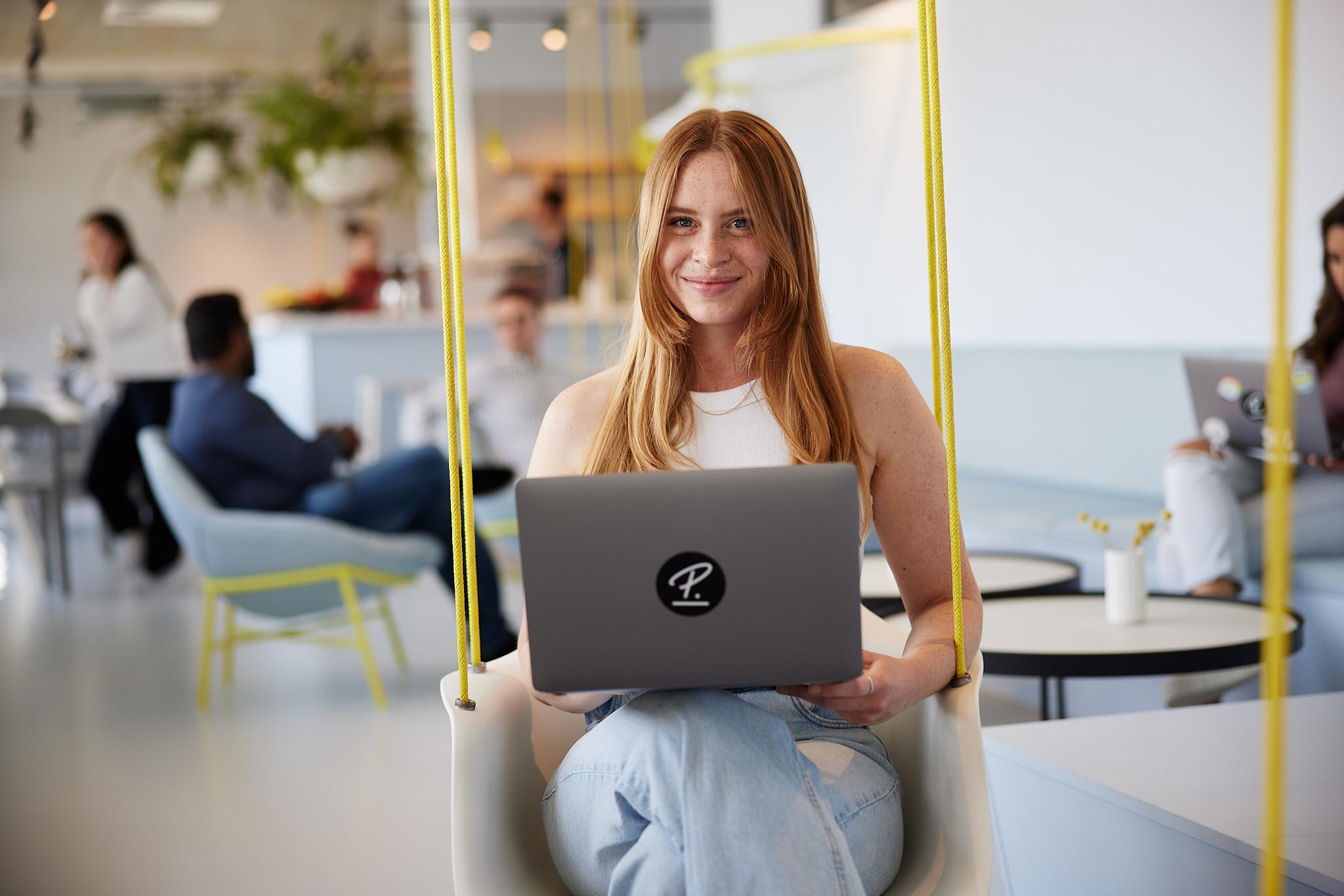 Woman Sitting with Laptop