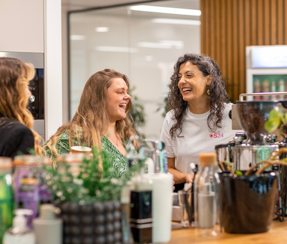 Employees at coffee machine