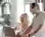 Man and woman looking at laptop