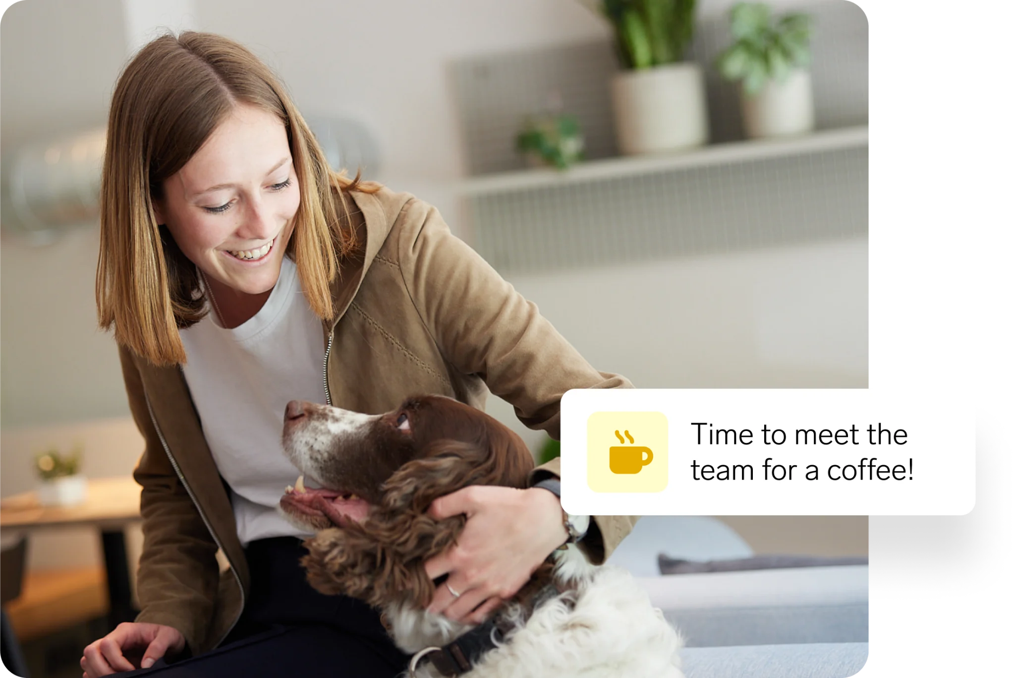 Co-worker petting a dog