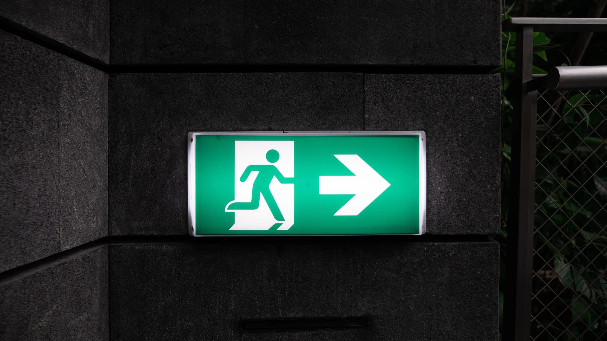 exit sign indicating gross misconduct dismissal
