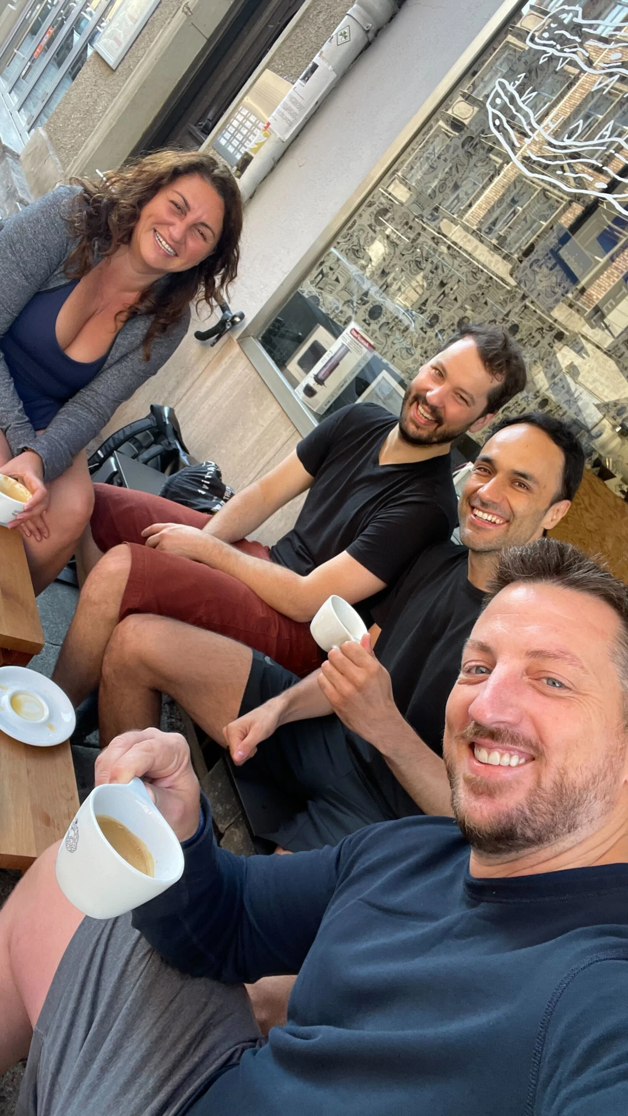 Justin enjoying coffee with some colleagues.