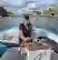 Anita Bax driving Personio boat on Amsterdam Canal
