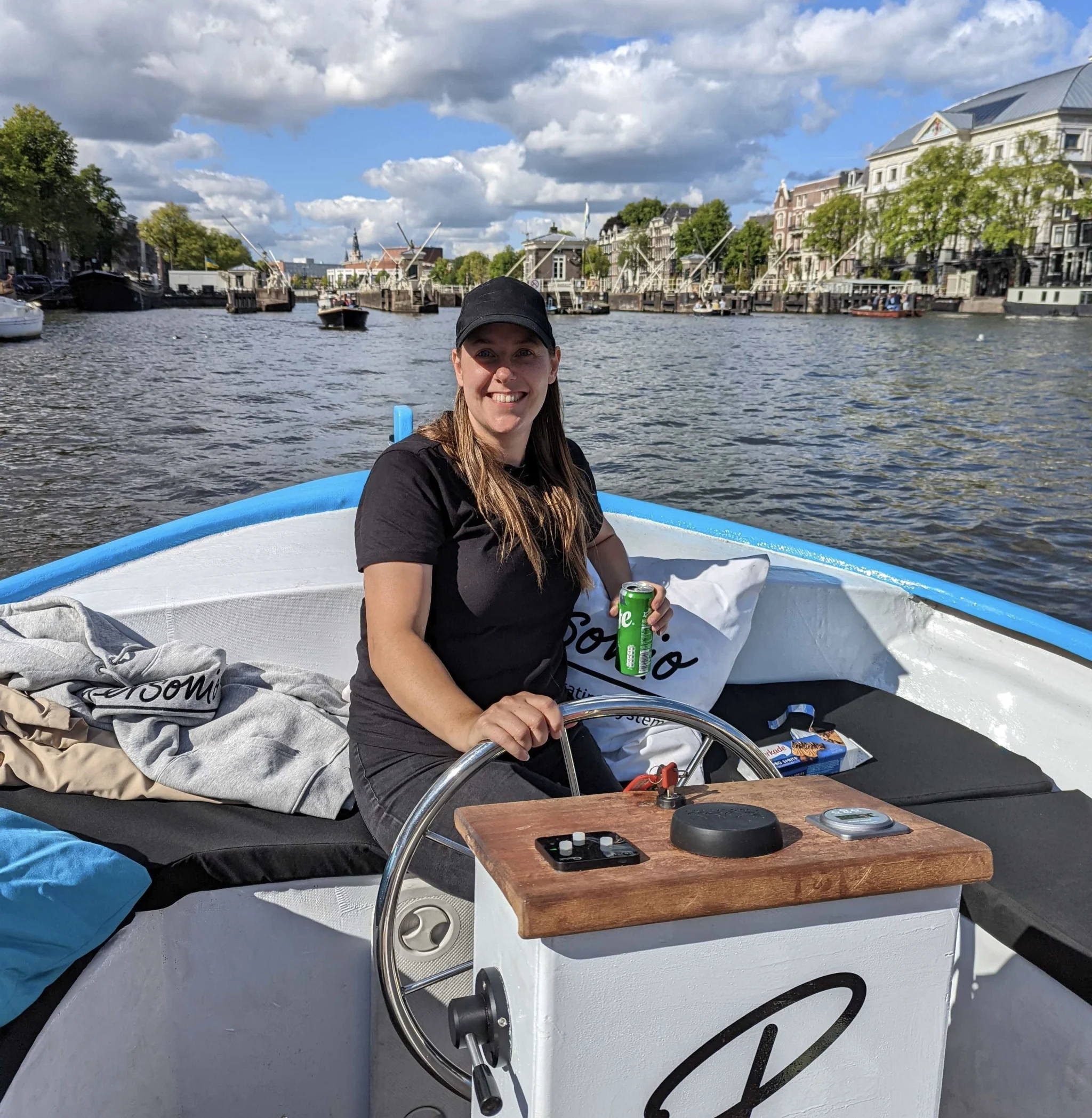 Anita Bax driving Personio boat on Amsterdam Canal