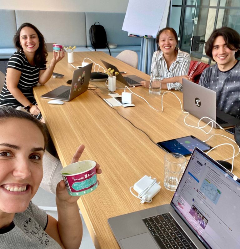 Bruna, Cláudia, Yunxi, and Andres enjoying a treat as they work together in the Munich office.