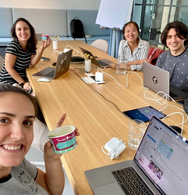 Bruna, Cláudia, Yunxi, and Andres enjoying a treat as they work together in the Munich office.