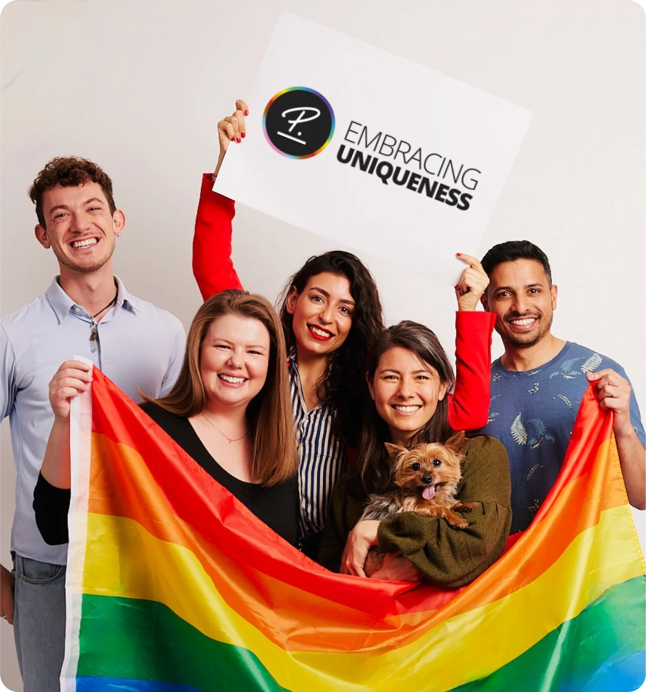 DEI pride group with flag and sign