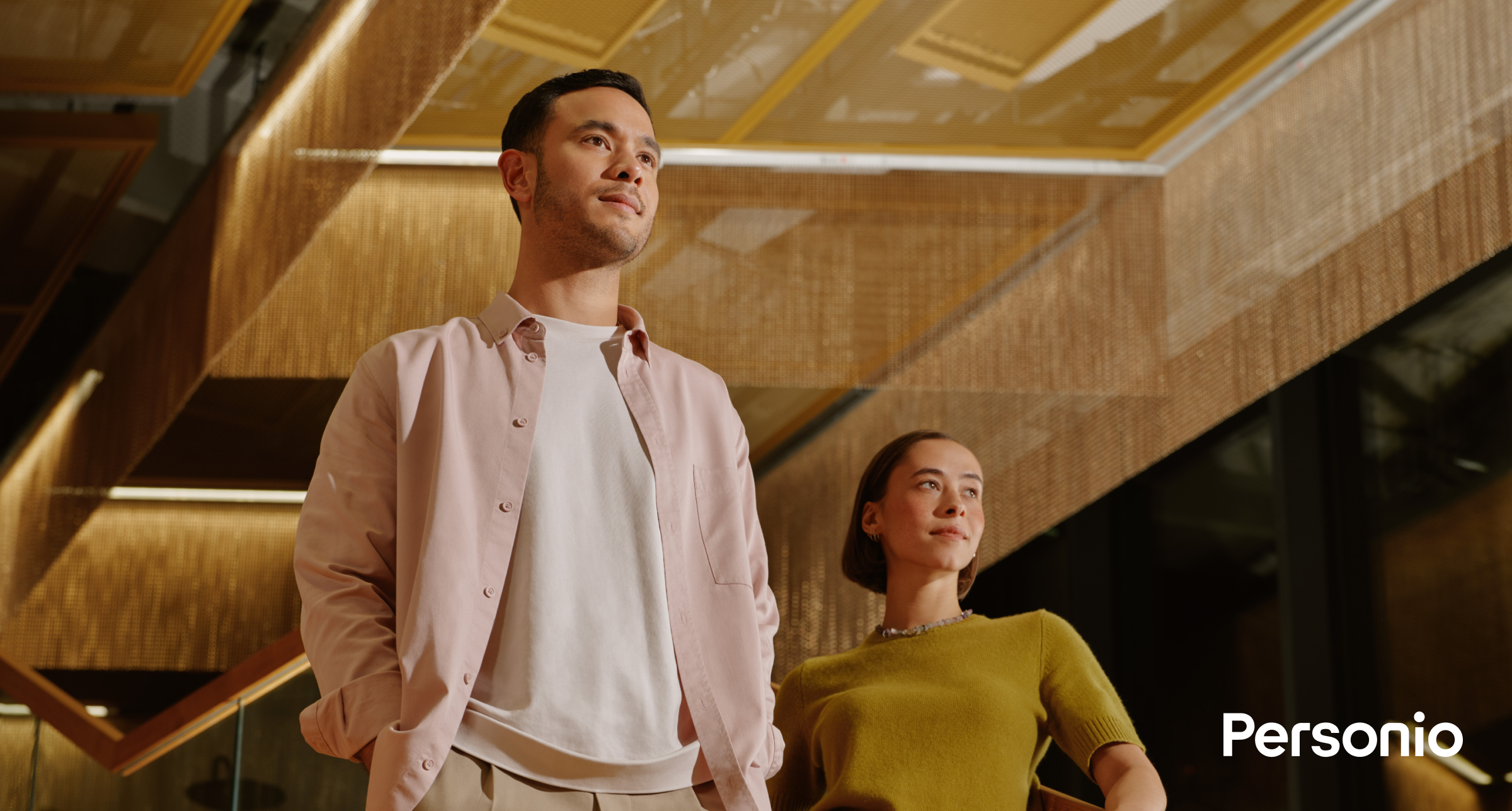 Two employees looking into middle distance