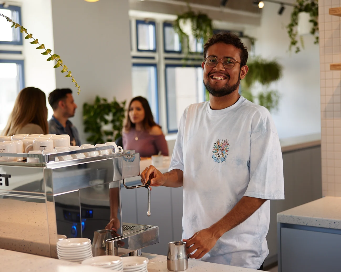 Person at coffee machine
