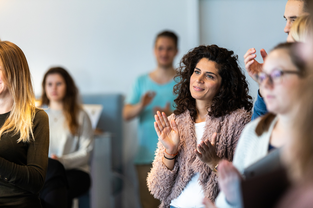 employee at a strategic human resource management meeting