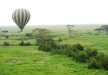 A majestic balloon in its voyage over the endless plains of Serengeti National Park