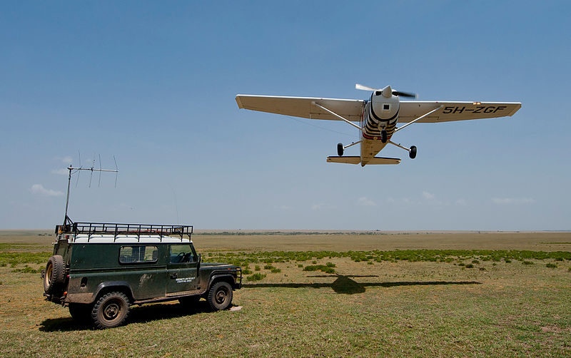 Landrover and plane in Serengeti, Tanzania.