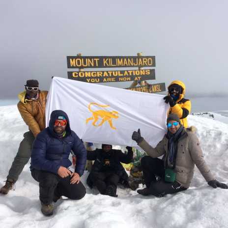 Trekkers celebrating after a successful summit to the highest point of Africa! 