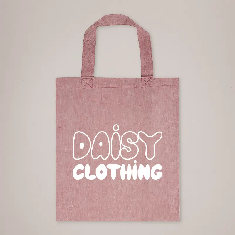 Pink recycled tote bag made from pre-consumer waste generated by factories during the fabric cutting process.