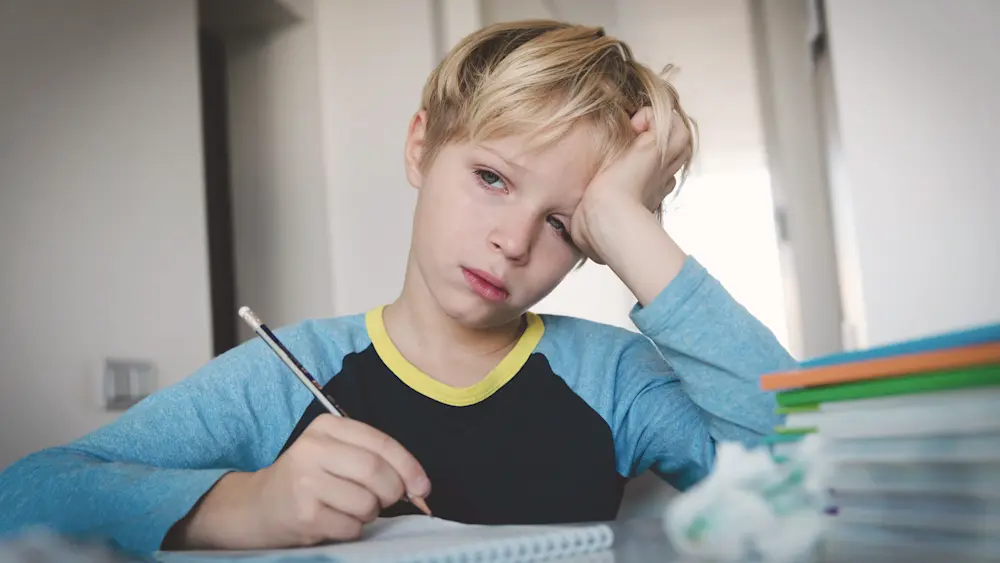 crying while doing homework