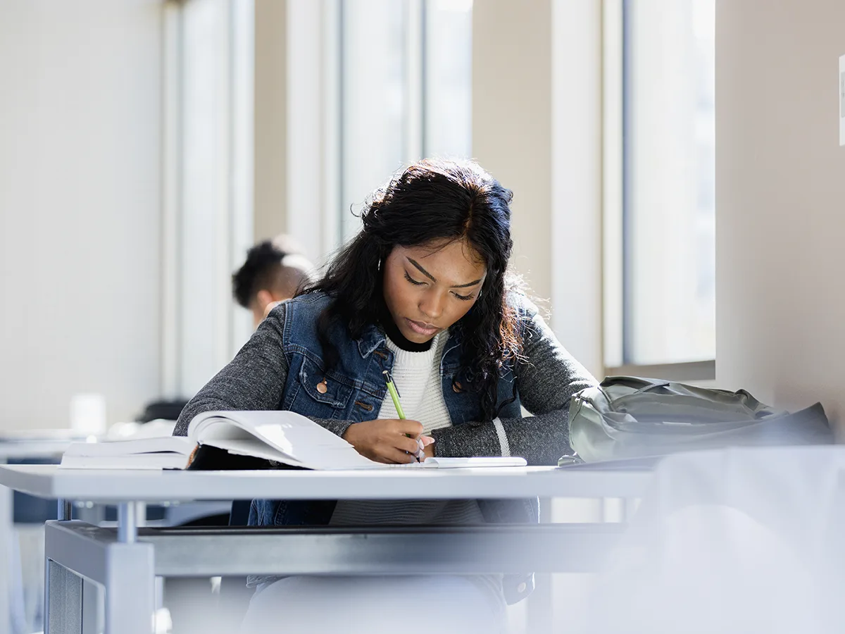 6 tips to help high-schoolers cope with test anxiety, girl taking a test in school