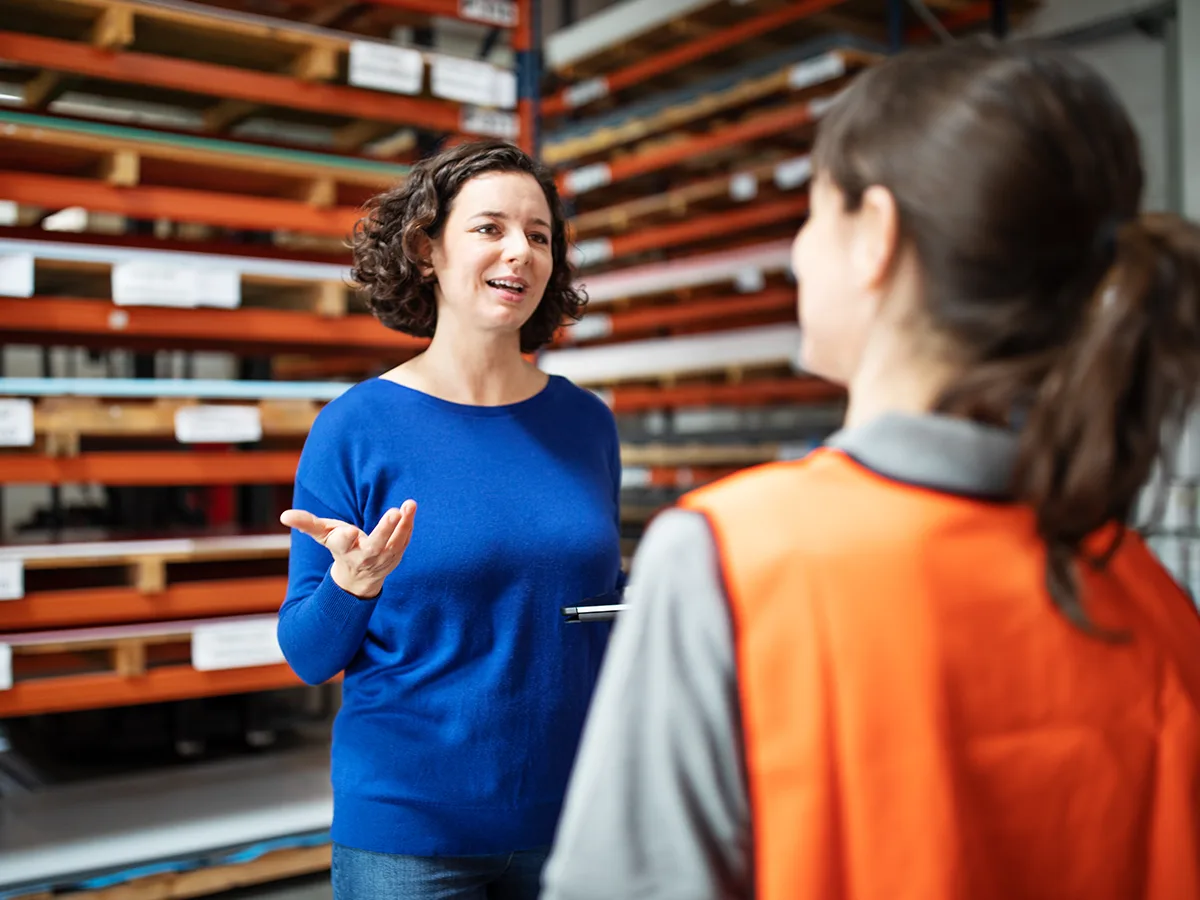 How to ask for flexibility at work, woman talking to manager at work