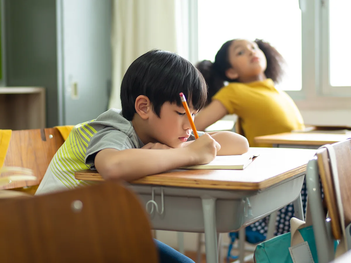 9 Reasons Kids Refuse Accommodations, kid in a classroom