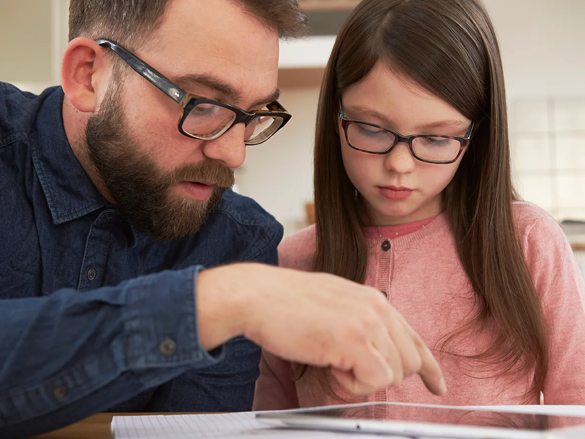 6 tips for helping your grade-schooler learn to self-advocate, dad talking to daughter