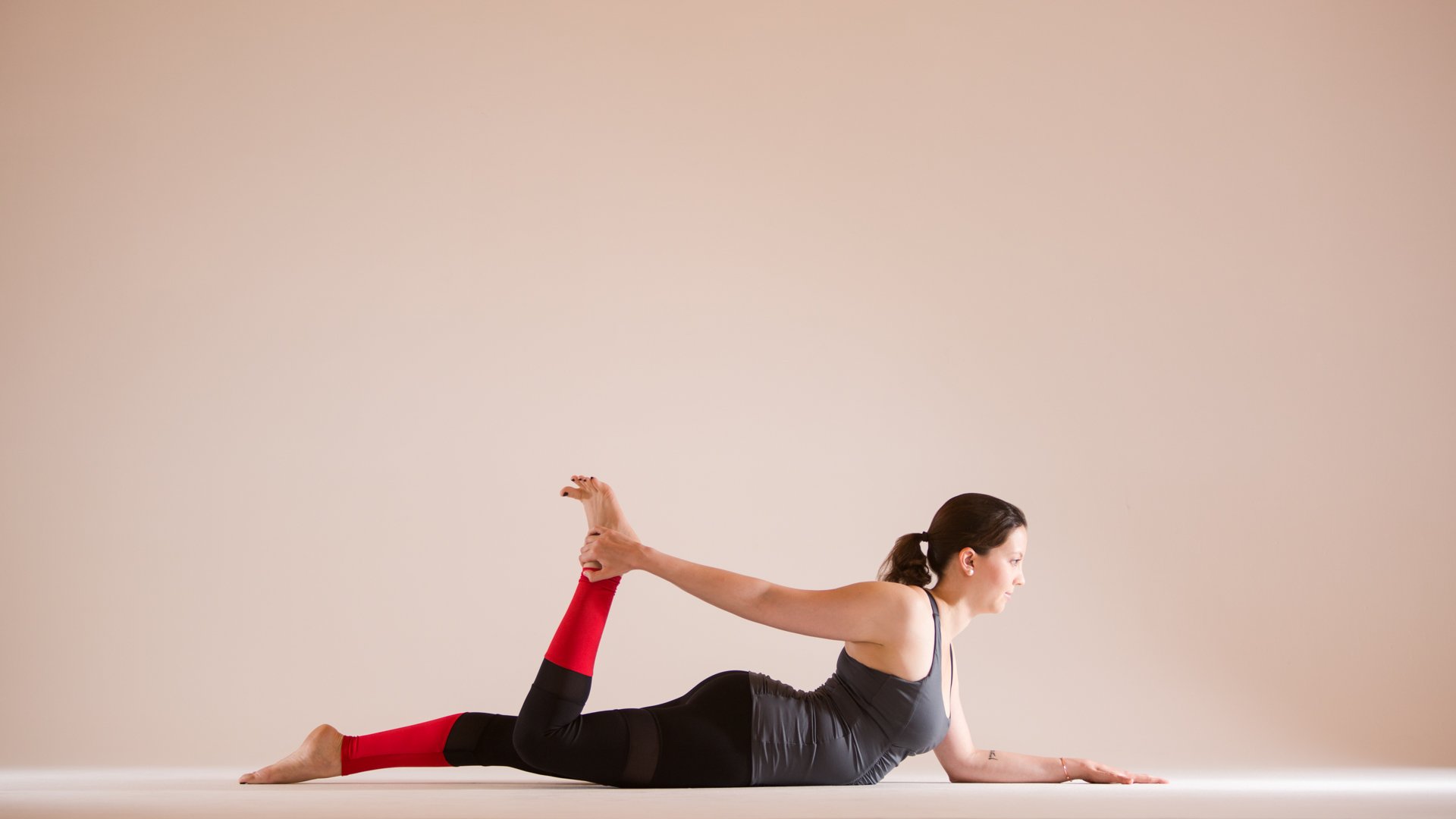 Sporty Yoga Girl On White Background In Dhanurasana (Bow Pose), Urdva  Chakrasana (Upward Wheel Pose) Stock Photo, Picture and Royalty Free Image.  Image 36160595.