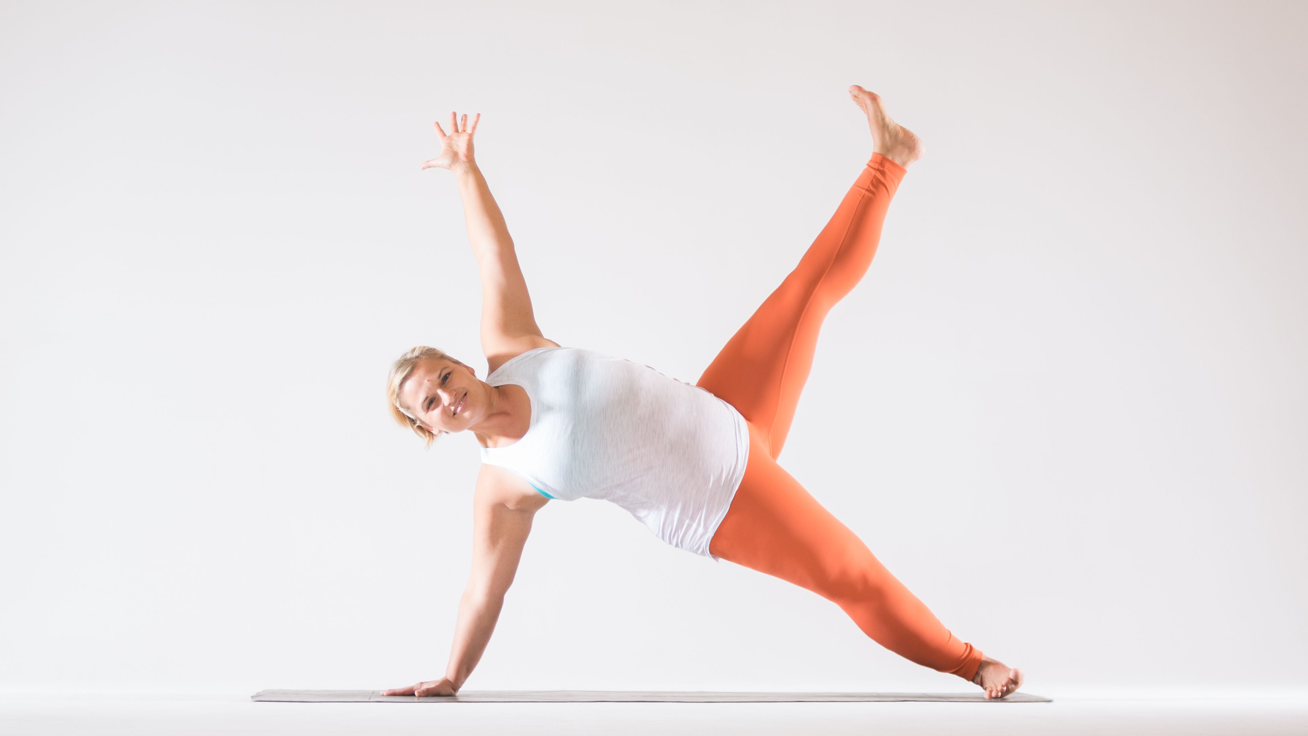 Premium Photo  Woman performing a variation of the uttanasana or standing  forward bend yoga pose for thigh