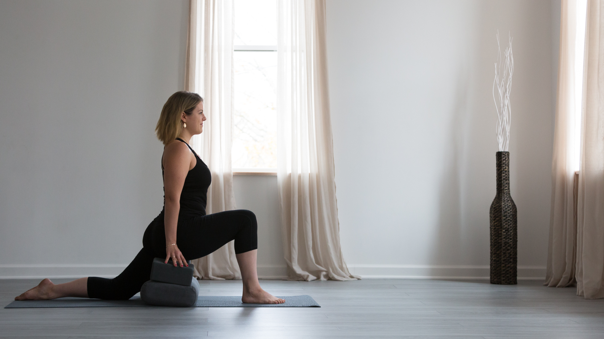 The Mythology Behind Anjaneyasana (Low Lunge) with yoga bolster