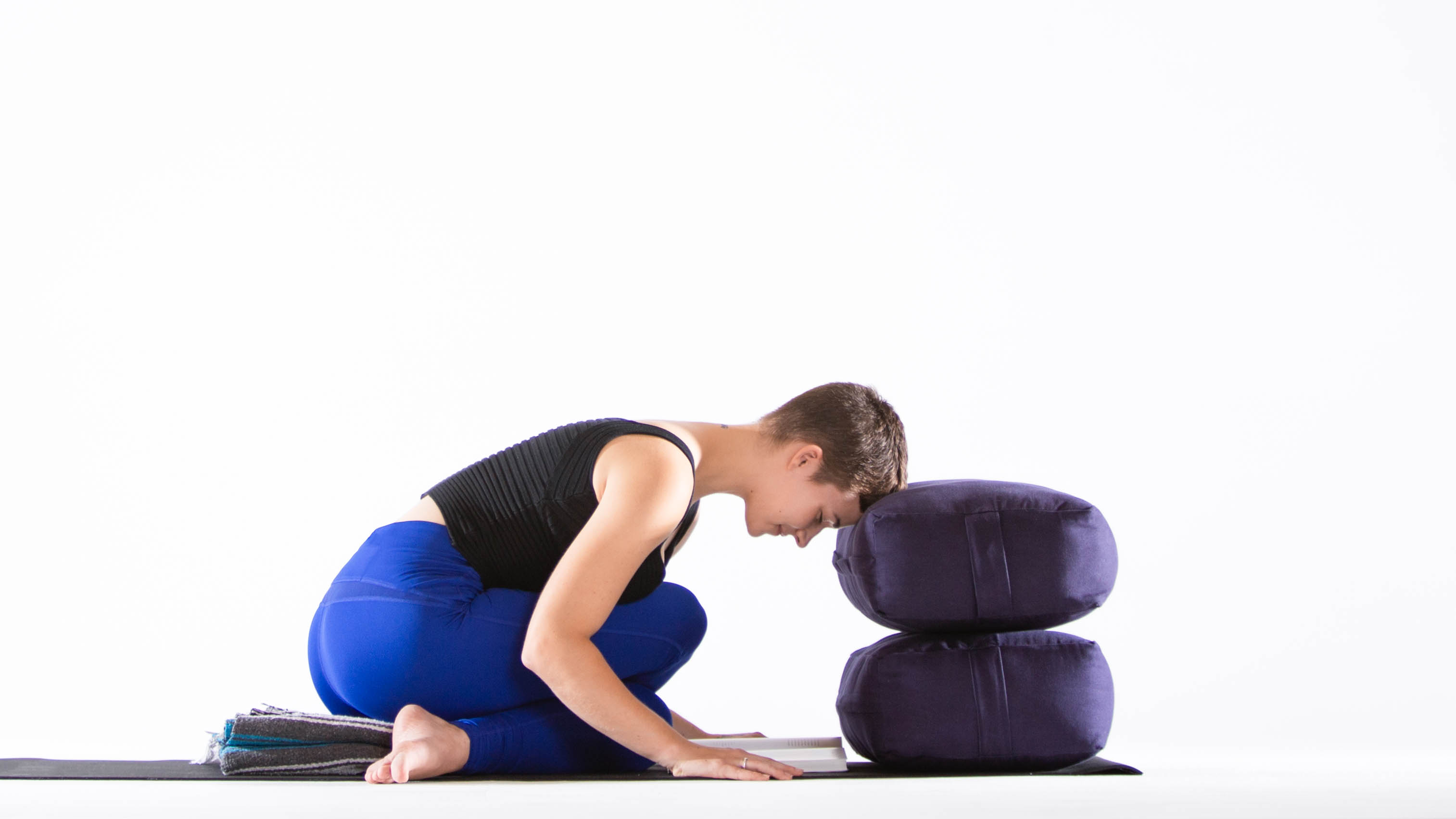 how to use yoga props - blocks, straps, bolsters, wheels - YOGI TIMES