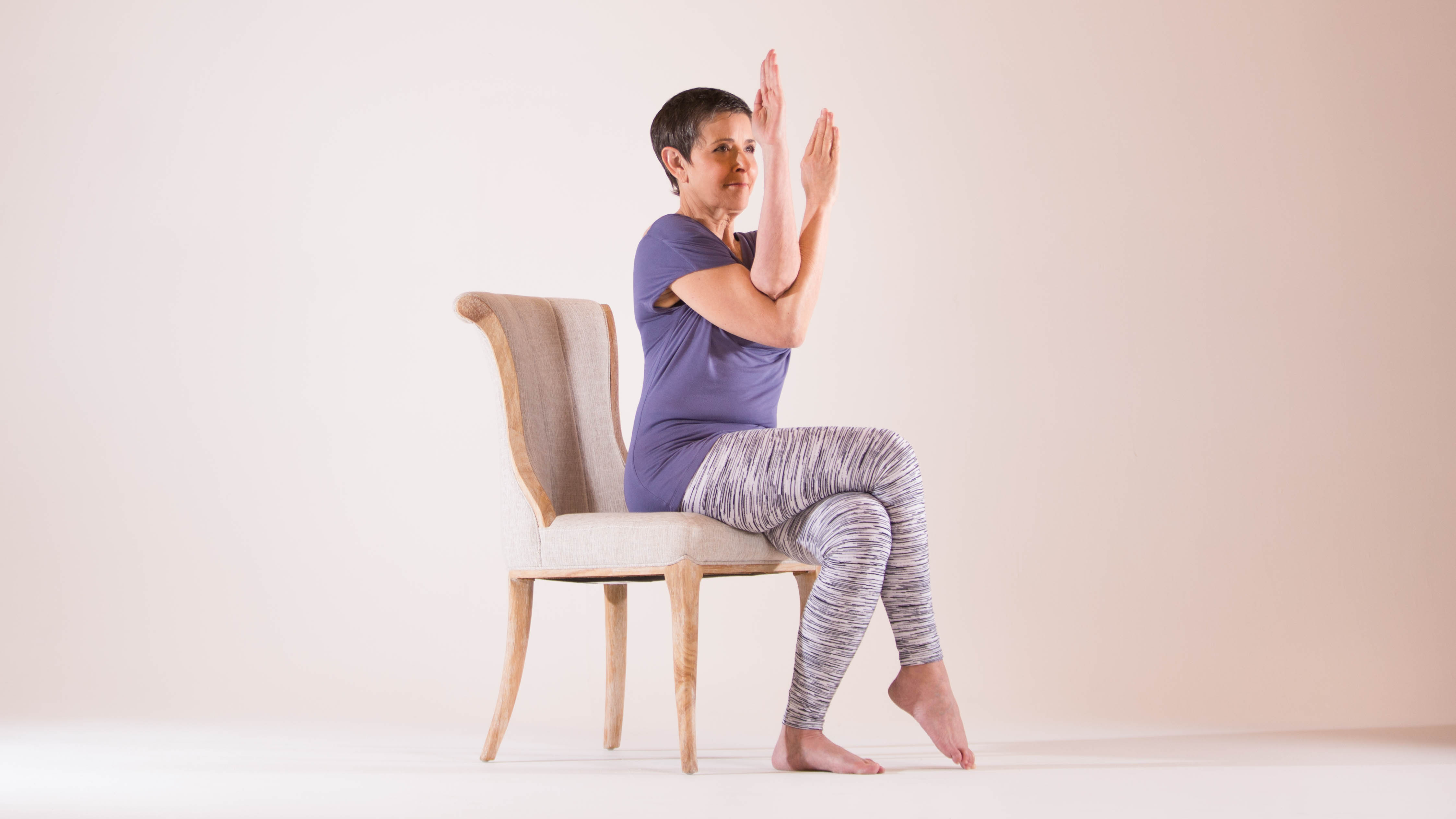 6 Chair Yoga Poses to Practice Anywhere | The Output by Peloton