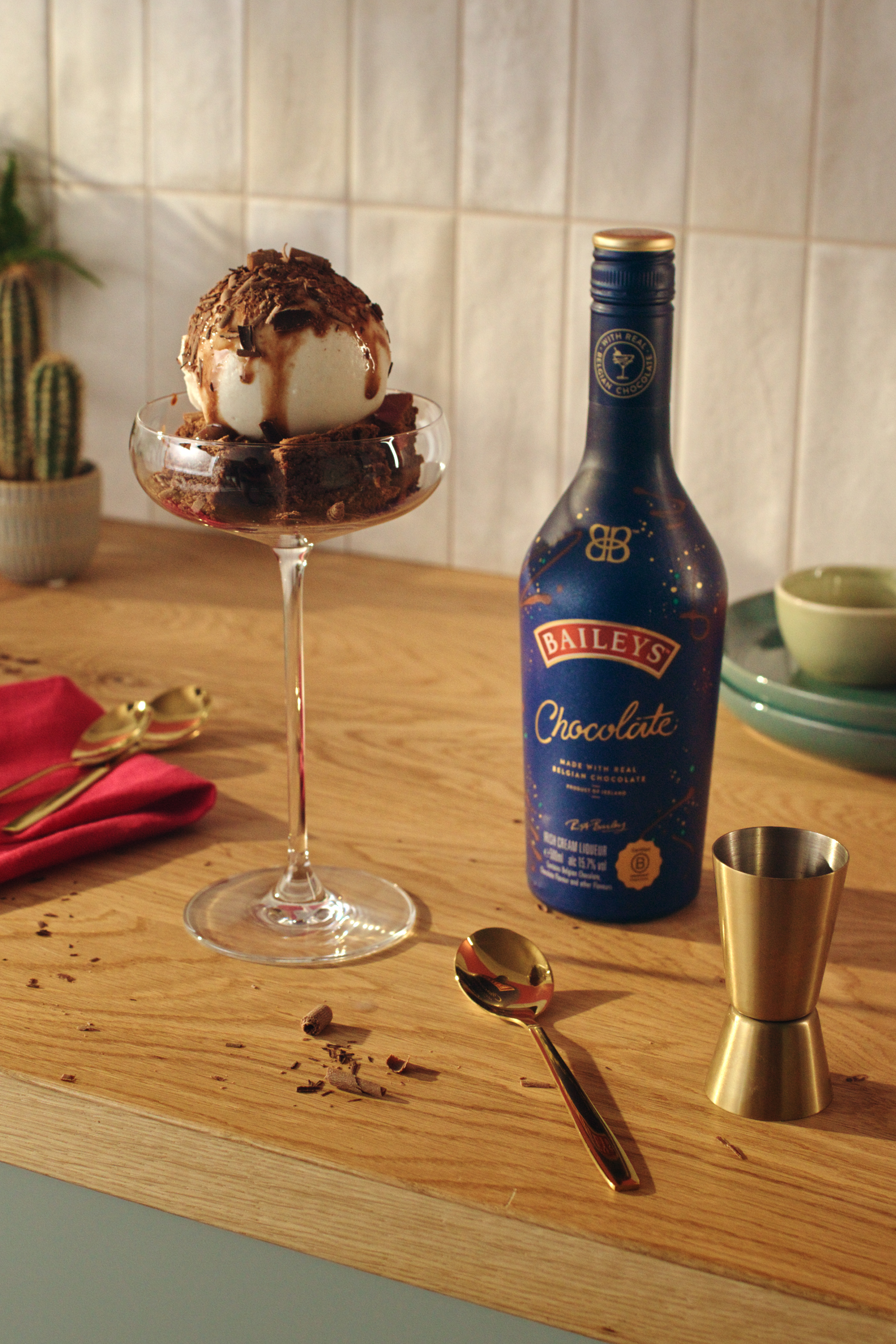 Baileys Chocolate next a brownie sundae in a cocktail glass