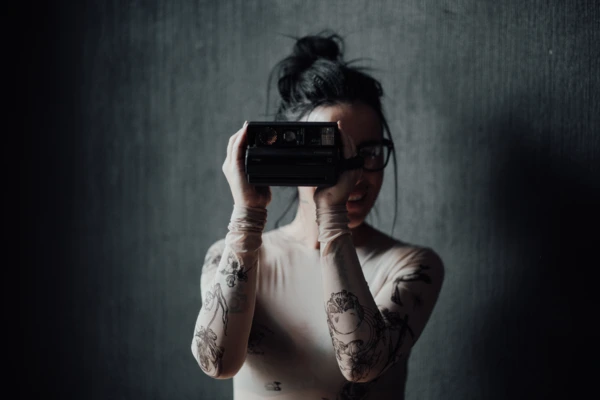 woman taking a photograph