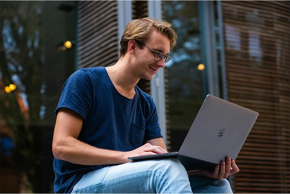 man-with-laptop-outdoors